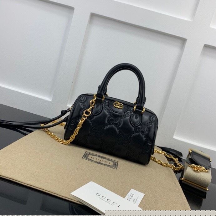 G*u*i speedy bags